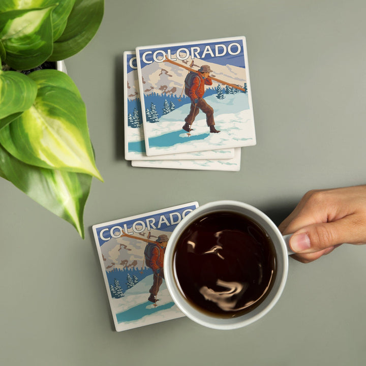 Colorado, Skier Carrying Skis, Coasters Coasters Lantern Press 
