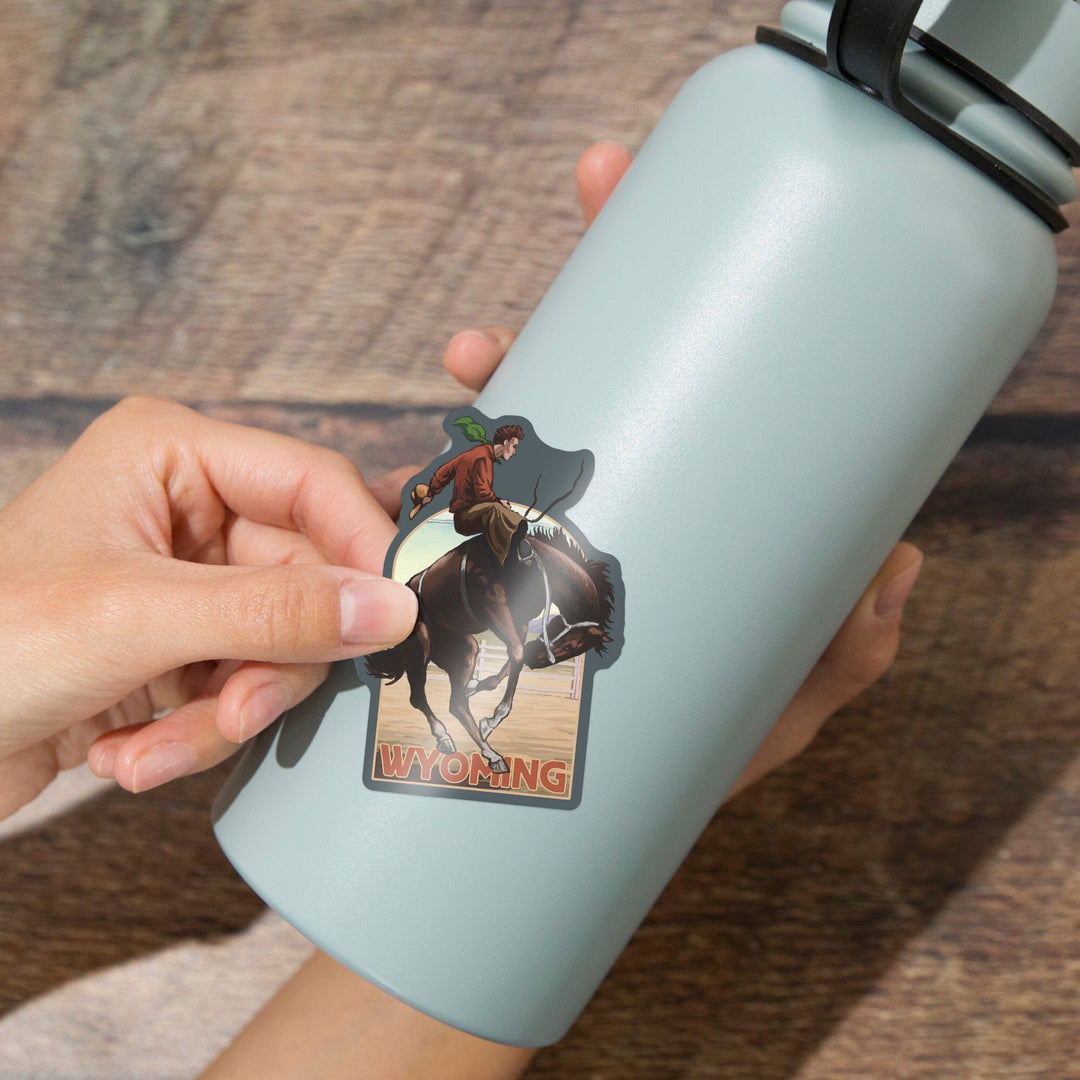 Wyoming, Cowboy and Bronco Scene, Contour, Vinyl Sticker Sticker Lantern Press 